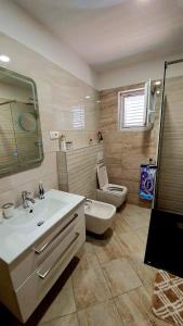Kúpeľňa v ubytovaní Apartmens Beach house