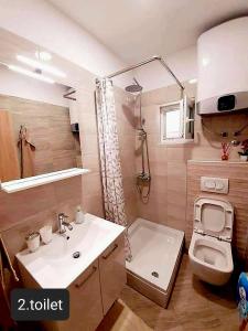 Kúpeľňa v ubytovaní Apartmens Beach house