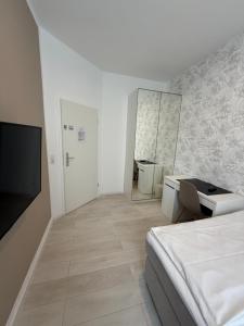Postel nebo postele na pokoji v ubytování Hotel Astra
