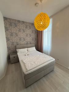 Postel nebo postele na pokoji v ubytování Hotel Astra