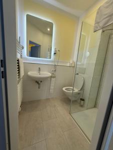 Koupelna v ubytování Hotel Astra