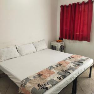 Ένα ή περισσότερα κρεβάτια σε δωμάτιο στο Maa yatri niwas home stay