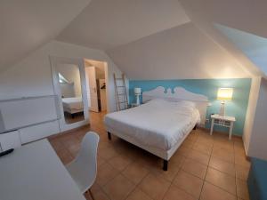 מיטה או מיטות בחדר ב-Exceptionnel T3 Vue Mer Village Vacances Sainte Luce