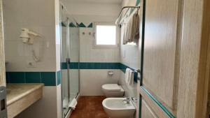 Ένα μπάνιο στο Relax at Residenze del Maria Rosaria-1BedApt B3 S3