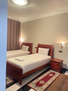 Llit o llits en una habitació de Hotel Ryad Tetouan Aero