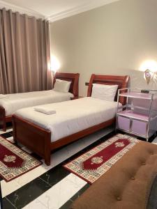 Llit o llits en una habitació de Hotel Ryad Tetouan Aero