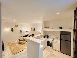 Kuchyň nebo kuchyňský kout v ubytování Le Refuge de Saint-Vincent