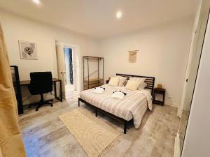 Postel nebo postele na pokoji v ubytování Le Refuge de Saint-Vincent