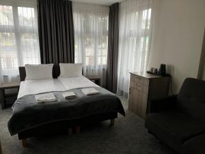 Villa Neos客房内的一张或多张床位