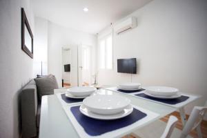 Telewizja i/lub zestaw kina domowego w obiekcie Fuencarral Apartments
