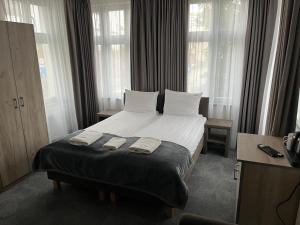 Villa Neos客房内的一张或多张床位