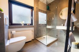 Ένα μπάνιο στο Staydia Link Living Apartment Ruhige Lage & Parkplatz +2 φωτογραφίες