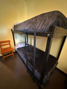 Postel nebo postele na pokoji v ubytování Hostel Punto Patagónico Bariloche