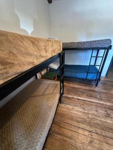 Postel nebo postele na pokoji v ubytování Hostel Punto Patagónico Bariloche