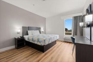 Postel nebo postele na pokoji v ubytování Motel 6-Rosenberg, TX