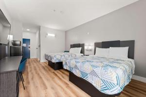 Postel nebo postele na pokoji v ubytování Motel 6-Rosenberg, TX