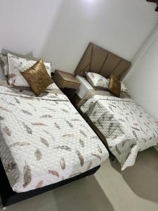Postel nebo postele na pokoji v ubytování Hotel Lesus