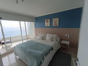 Postel nebo postele na pokoji v ubytování Concon Amazing Ocean View en primera linea