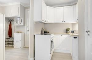 Η κουζίνα ή μικρή κουζίνα στο Cozy apartment in the heart of Haugesund