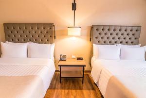 GHL Hotel Bogota Occidente客房内的一张或多张床位