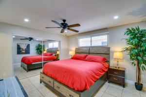 a bedroom with two beds and a ceiling fan at Golf, Shop and Hike Youngtown Hideaway! in Youngtown +19 photos