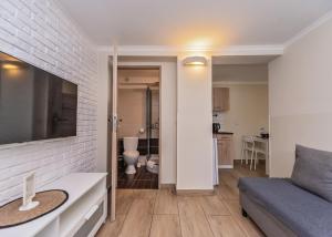 Kuchnia lub aneks kuchenny w obiekcie Willa Aleksandra - Apartamenty