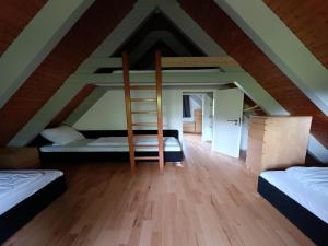Postel nebo postele na pokoji v ubytování Bungalow in Waldbrunn