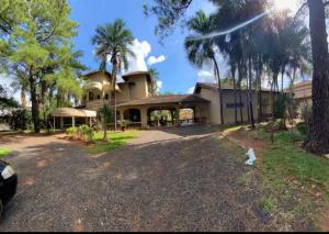 an image of a house with a tower at desativado in Sao Jose do Rio Preto +6 photos