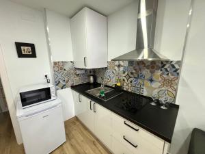 Kuchyň nebo kuchyňský kout v ubytování ANSA Beach Apartments - Why Not Málaga