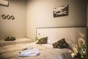 Postel nebo postele na pokoji v ubytování Foresteria Del Pescatore