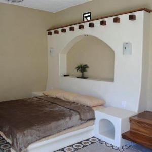 Katil atau katil-katil dalam bilik di Turtle Beach Villas