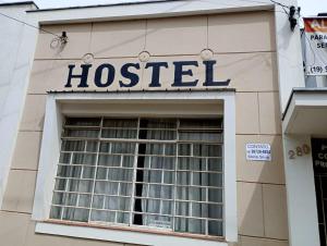 a hospital sign on the side of a building at Hostel Baladi in Socorro