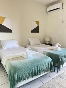 Katil atau katil-katil dalam bilik di Seaview Apartel