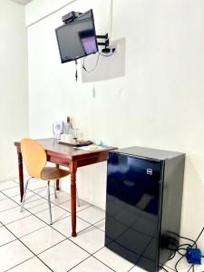 Televisyen dan/atau pusat hiburan di Seaview Apartel