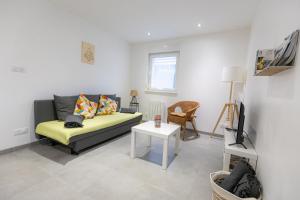 Χώρος καθιστικού στο Appartement cosy et lumineux à Kaysersberg