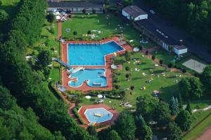 an overhead view of a park with a pool at Wyzenborne in Sontra