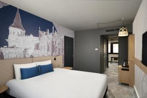 Posteľ alebo postele v izbe v ubytovaní Mercure Budapest Castle Hill
