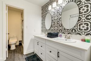 a bathroom with a sink and a toilet at Private Hot Tub and Golf Course Views Lakeway Gem in Lakeway +17 photos