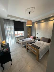 Posteľ alebo postele v izbe v ubytovaní Business Flat Stavroupoli