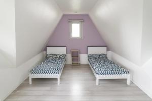 Postel nebo postele na pokoji v ubytování Kerlavost6