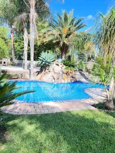 Hồ bơi trong/gần Hillside exquisite executive lodge