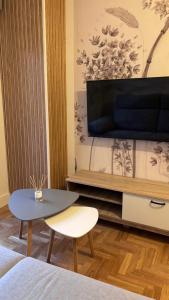 TV a/nebo společenská místnost v ubytování Rincón Cristóbal de Castillejo