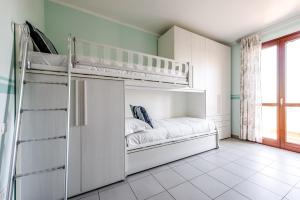 Postel nebo postele na pokoji v ubytování Hostly-Family Home Fosso Vecchio-Relax in Tuscany