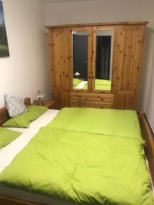 a bedroom with two beds and a window at Zum Gogerer in Floß