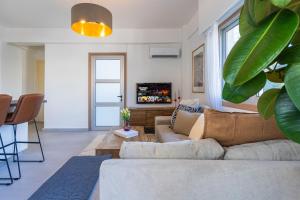 Χώρος καθιστικού στο Elegant City Central Suite