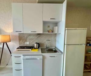 Η κουζίνα ή μικρή κουζίνα στο Romantic Getaway Studio Suite Sea View at Kartal