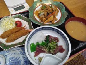 a tray of different plates of food on a table at Ogawaya Ryokan - Vacation STAY 16050v in Tahara