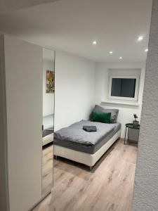 Ένα ή περισσότερα κρεβάτια σε δωμάτιο στο Modernes, stilvolles Apartment 4