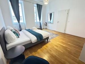 Ένα ή περισσότερα κρεβάτια σε δωμάτιο στο Charming Flat & Balcony near Central Station l BG5