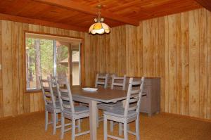 a dining room with a table and chairs at Mountain Retreat in Wawona